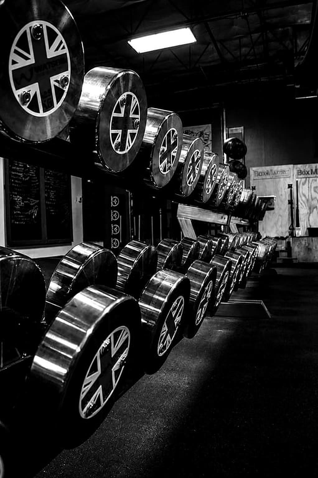 The dumbbell rack on the training floor at MARR STRENGTH.